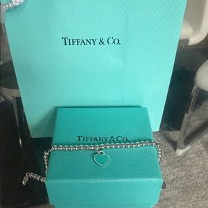 Tiffany & Co. Silver Bead Bracelet with Blue Heart Accent